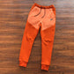 NIKE TECH FLEECE PANTS x CAMPFIRE ORANGE