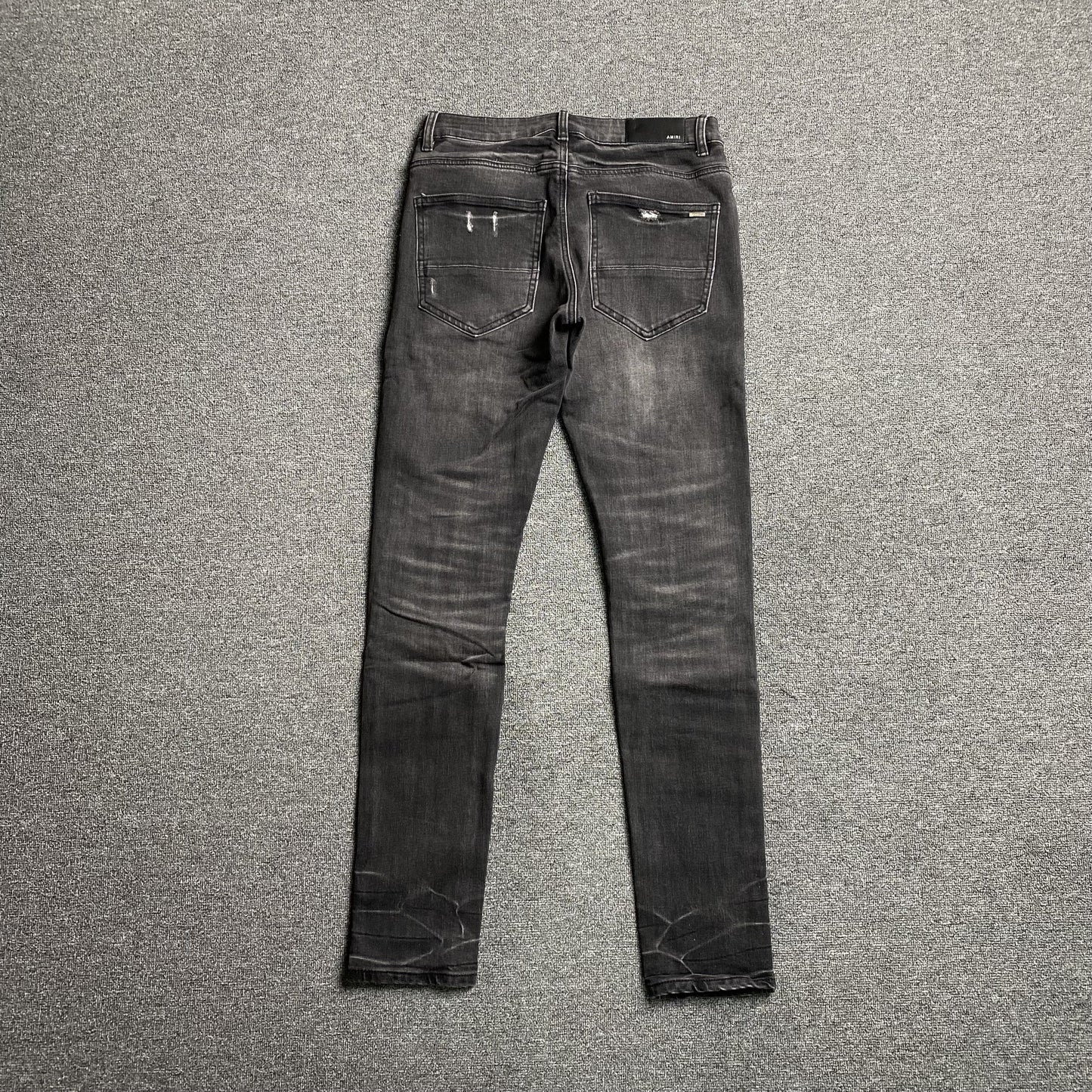 AMIRI SLASH SLIM JEANS