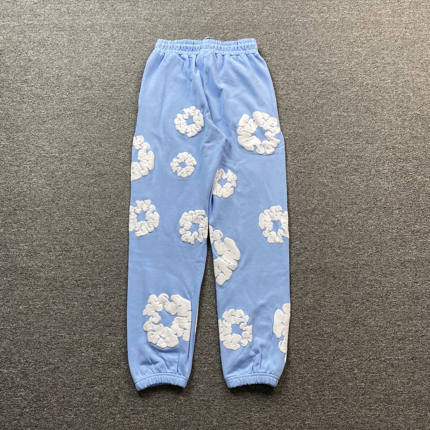 DENIM TEARS COTTON WREATH SWEATPANTS BABY BLUE