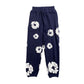DENIM TEARS COTTON WREATH SWEATPANTS NAVY