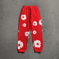 DENIM TEARS COTTON WREATH SWEATPANTS RED