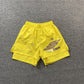 SP5DER DOUBLE LAYER SHORTS YELLOW