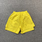 SP5DER DOUBLE LAYER SHORTS YELLOW
