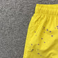 SP5DER DOUBLE LAYER SHORTS YELLOW