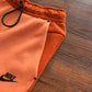 NIKE TECH FLEECE PANTS x CAMPFIRE ORANGE